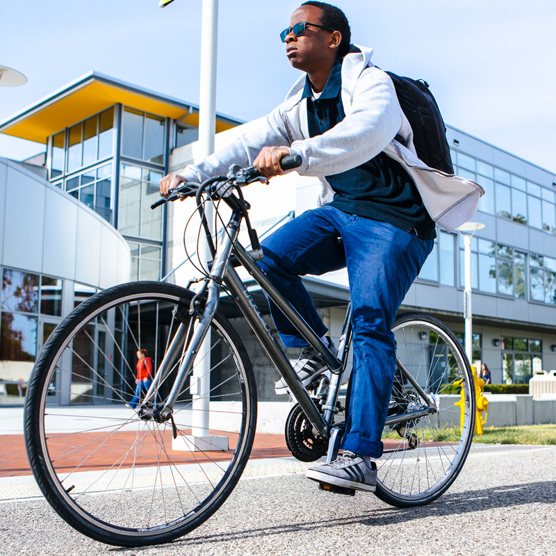 Student on Bike at HSSB